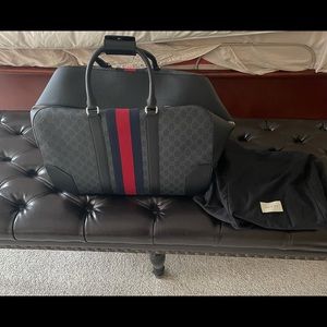 Authentic Gucci Rolling Luggage Travel bag w/web